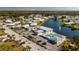 Large community with lakefront, clubhouse, and pool at 672 Circlewood Dr # V9, Venice, FL 34293
