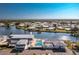 Community with lake, pool, and numerous houses at 672 Circlewood Dr # V9, Venice, FL 34293