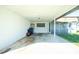 Covered carport with space for one vehicle and storage area at 672 Circlewood Dr # V9, Venice, FL 34293