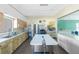 Community kitchen with ample counter space and prep area at 672 Circlewood Dr # V9, Venice, FL 34293