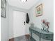 Entryway with console table and decorative accents at 672 Circlewood Dr # V9, Venice, FL 34293