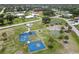 Neighborhood park with playground, basketball court, and open space at 7257 Bridgeport Ln, Englewood, FL 34224