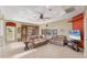 Bright and airy living room with comfortable seating and large windows at 7257 Bridgeport Ln, Englewood, FL 34224