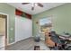 Bright home office with a large window and built in shelving at 7257 Bridgeport Ln, Englewood, FL 34224