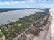 Expansive aerial showcasing waterfront property and surroundings at 7475 Manasota Key Rd, Englewood, FL 34223