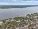 Wide aerial view of waterfront lot and river access at 7475 Manasota Key Rd, Englewood, FL 34223