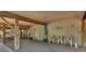 Covered patio area with seating and storage at 7475 Manasota Key Rd, Englewood, FL 34223