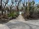 Peaceful nature trail leads to waterfront views at 7475 Manasota Key Rd, Englewood, FL 34223
