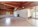 Living room with stone fireplace and wood ceiling at 7630 Manasota Key Rd, Englewood, FL 34223