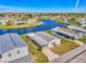 Mobile home community with a central lake at 812 Seabrooke Dr, Englewood, FL 34223