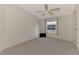 Bright bedroom with carpet flooring and a window at 812 Seabrooke Dr, Englewood, FL 34223