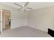 Spacious bedroom featuring carpet and ceiling fan at 812 Seabrooke Dr, Englewood, FL 34223