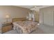 Bedroom with floral bedding and built-in closet at 812 Seabrooke Dr, Englewood, FL 34223