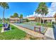 Relaxing bocce ball court with benches and shade at 812 Seabrooke Dr, Englewood, FL 34223