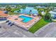 Community pool with plenty of lounge chairs at 812 Seabrooke Dr, Englewood, FL 34223