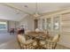Open dining area with view into living room and kitchen at 812 Seabrooke Dr, Englewood, FL 34223