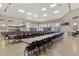 Large community dining room with numerous tables and chairs at 812 Seabrooke Dr, Englewood, FL 34223