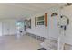 Front entrance with steps and covered porch at 812 Seabrooke Dr, Englewood, FL 34223