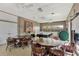 Community game room with tables, chairs, and pool table at 812 Seabrooke Dr, Englewood, FL 34223