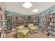 Community library with ample bookshelves and comfortable seating at 812 Seabrooke Dr, Englewood, FL 34223