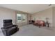 Living room featuring a couch, chairs, and a coffee table at 812 Seabrooke Dr, Englewood, FL 34223