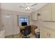 Home office with built-in cabinets and desk at 812 Seabrooke Dr, Englewood, FL 34223