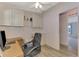 Bright office space with wood desk and built-ins at 812 Seabrooke Dr, Englewood, FL 34223