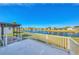 Relaxing patio with lake view and access to a 55+ community at 812 Seabrooke Dr, Englewood, FL 34223