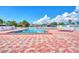 Community pool area with a pool and hot tub at 812 Seabrooke Dr, Englewood, FL 34223