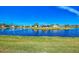 Scenic waterfront property with beautiful lake views and landscaping at 812 Seabrooke Dr, Englewood, FL 34223