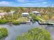 Waterfront home with private dock and kayak, offering serene water views at 900 Oxford Dr, Englewood, FL 34223