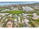 Aerial view highlighting a waterfront home's location and surroundings at 900 Oxford Dr, Englewood, FL 34223