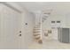 Finished basement with spiral staircase and extra storage at 900 Oxford Dr, Englewood, FL 34223