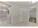 Unfinished basement with multiple rooms and tile flooring at 900 Oxford Dr, Englewood, FL 34223