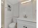 Small bathroom with shower and white vanity at 900 Oxford Dr, Englewood, FL 34223