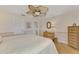 King bed, light and bright with access to a hallway bathroom at 900 Oxford Dr, Englewood, FL 34223
