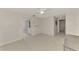Bedroom with tile floors and access to bathroom at 900 Oxford Dr, Englewood, FL 34223