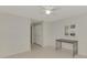 Bedroom with tile floors, closet, and window with shutters at 900 Oxford Dr, Englewood, FL 34223