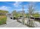 Wooden dock with boat lift and waterfront access at 900 Oxford Dr, Englewood, FL 34223