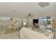 Bright living room with comfy seating, and access to a balcony at 900 Oxford Dr, Englewood, FL 34223