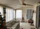 Cozy Florida room with tiled floor and seating at 914 E 2Nd St, Englewood, FL 34223