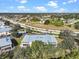 Wide aerial view of the community and surrounding area at 9900 Fiddlers Green Cir # 237, Rotonda West, FL 33947