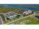 Aerial view showing building near golf course and water at 10045 Links Ln # 203, Rotonda West, FL 33947