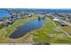 Aerial view of golf course community near the water at 10045 Links Ln # 203, Rotonda West, FL 33947