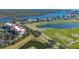 Aerial view showcasing building near the waterway at 10045 Links Ln # 203, Rotonda West, FL 33947