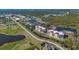 Aerial view highlighting building's waterfront location at 10045 Links Ln # 203, Rotonda West, FL 33947