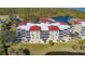 Aerial view of building exterior, showcasing the unit at 10045 Links Ln # 203, Rotonda West, FL 33947