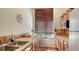Small kitchenette in the clubhouse with full sized appliances at 10045 Links Ln # 203, Rotonda West, FL 33947