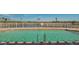 Inviting community pool with a view of the canal at 10045 Links Ln # 203, Rotonda West, FL 33947