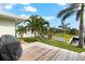 Wooden deck overlooking the canal, perfect for grilling at 10322 Sunbury Dr, Port Charlotte, FL 33981